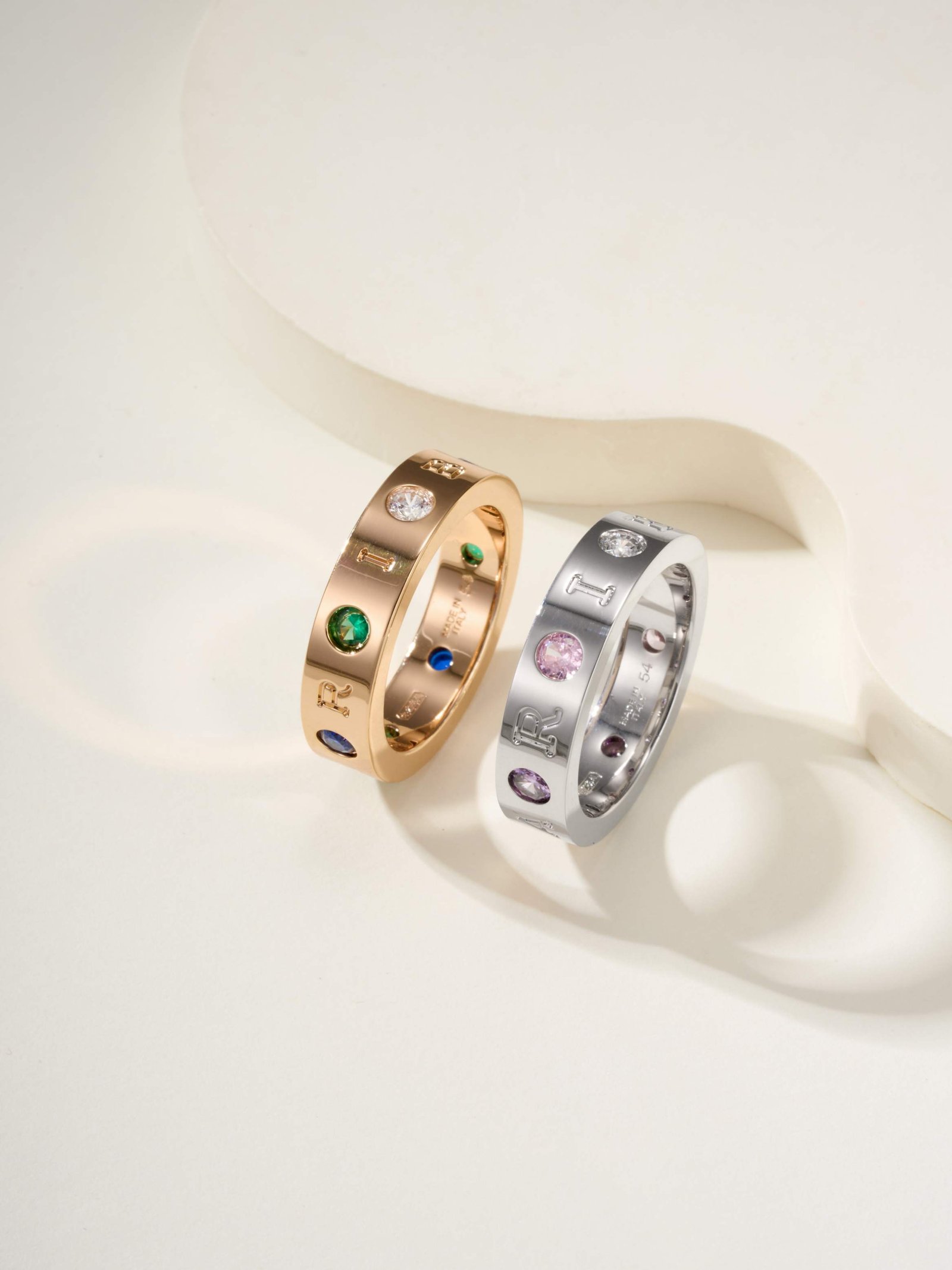 BV letter logo colored diamond ring