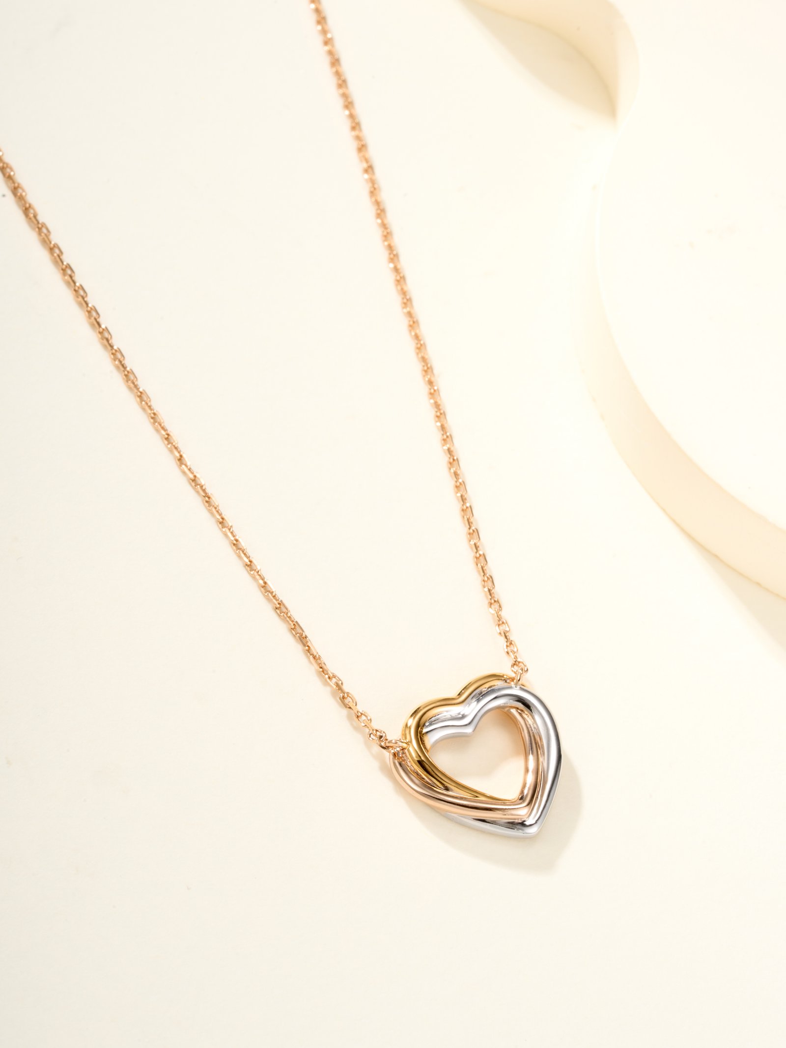 Trinity heart-shaped tricolor diamond studded small necklace