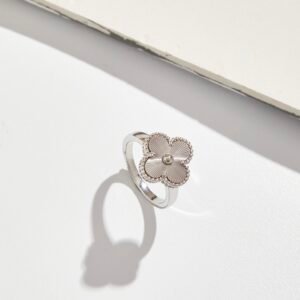 Carved four leaf clover ring