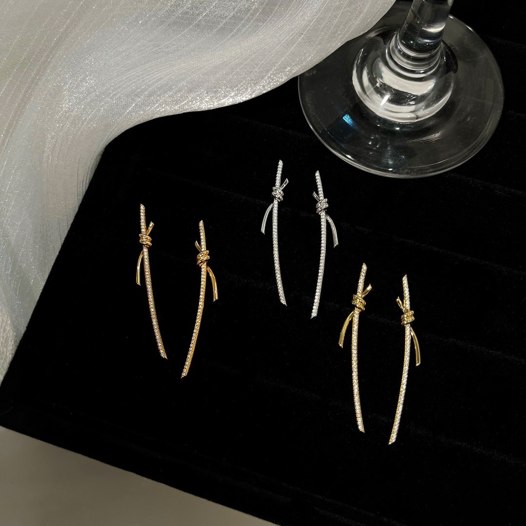 T Knot series long string earrings