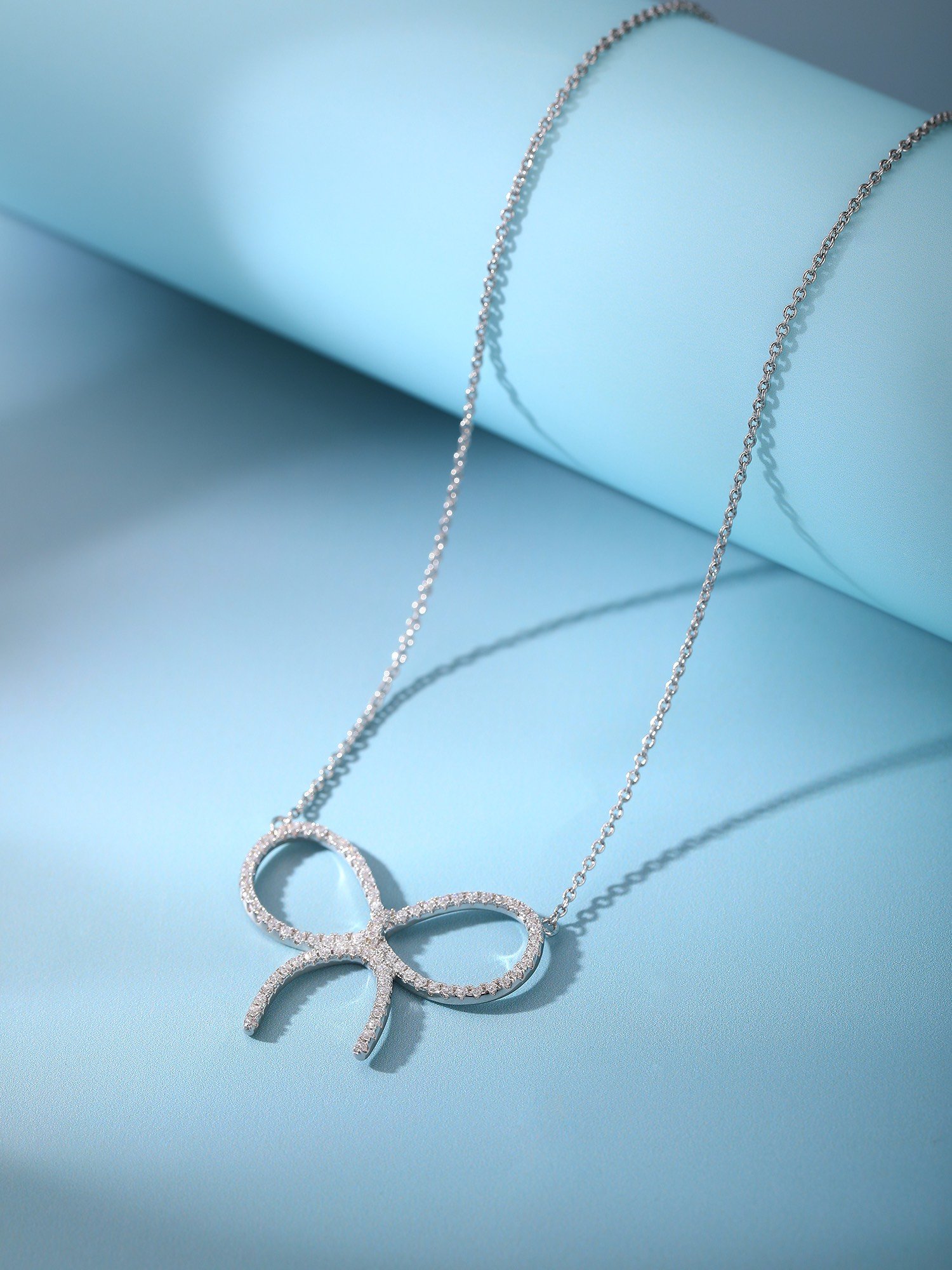 Handmade diamond studded bow necklace