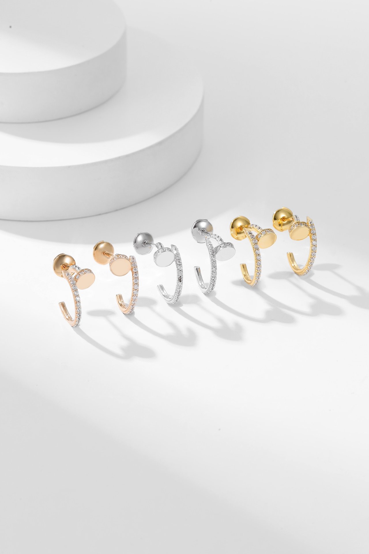 Nail studded earrings